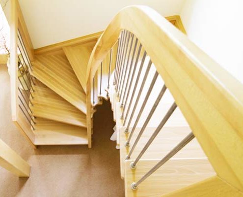 Ash-stair-with-curved-handrail