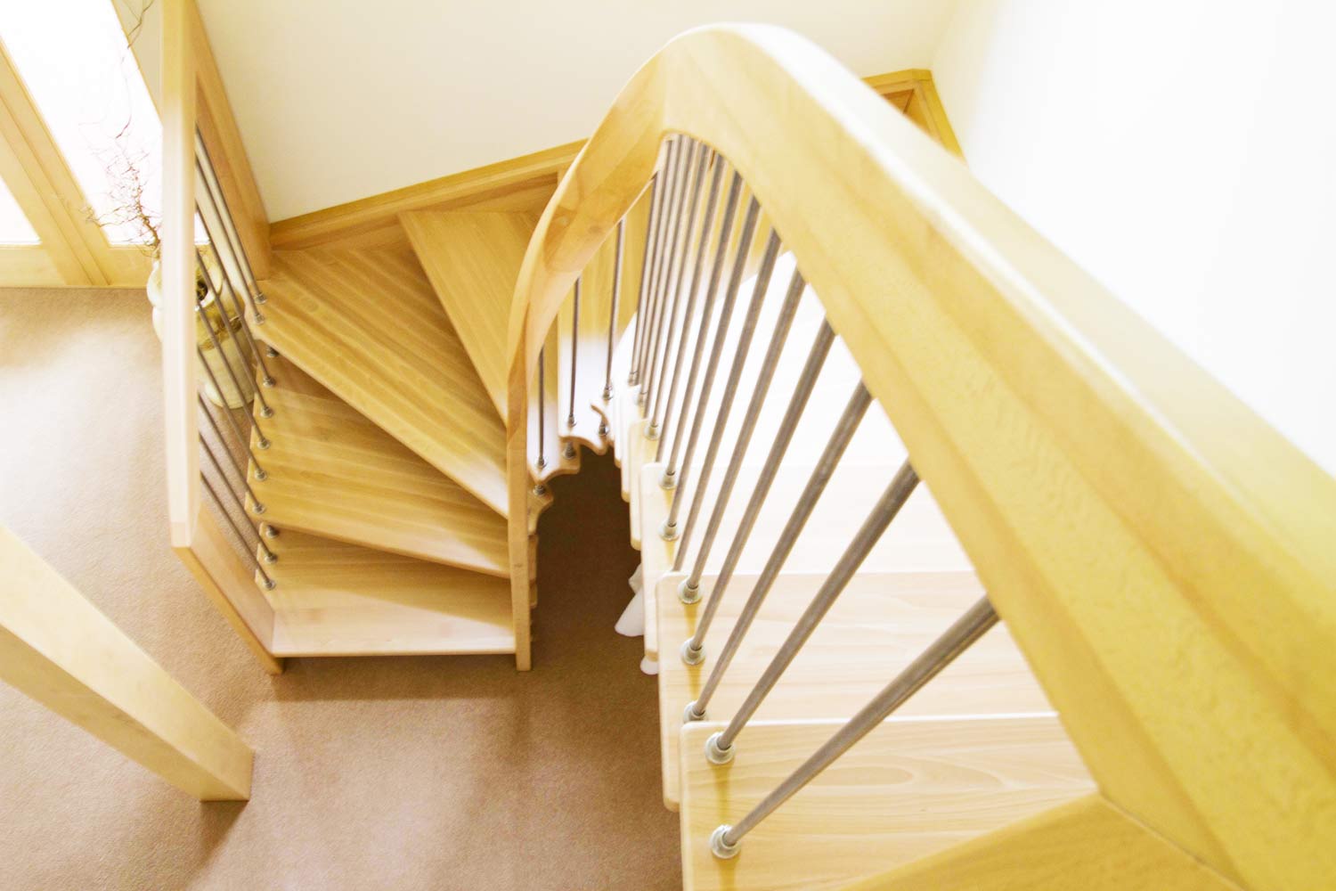Ash-stair-with-curved-handrail